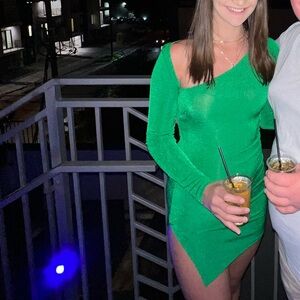 Slinky green asymmetric neck bodycon dress with slit